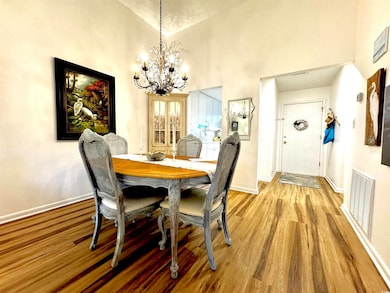 Dining space featuring light wood-type flooring, h