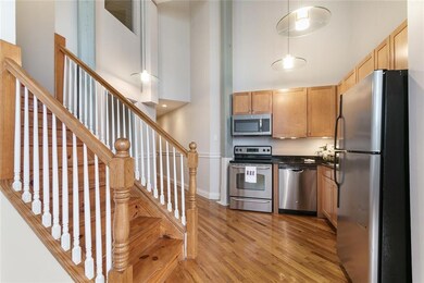 From the living room, looking back to the kitchen,