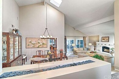 Another view toward formal dining with skylight, l