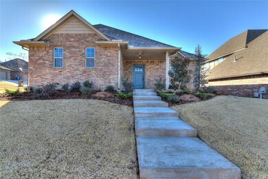 View of front of house featuring a shingled roof, 