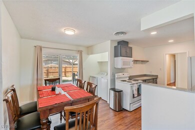 Dining space with light wood-type flooring, recess