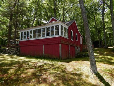 Exterior Front. Front porch overlooks  water. This