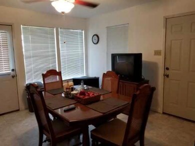 Dining room featuring ceiling fan