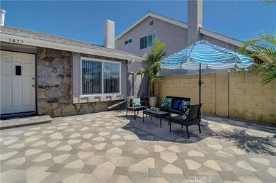 Lovely, enclosed entry courtyard extends your living space outdoors...love the pavers here too!