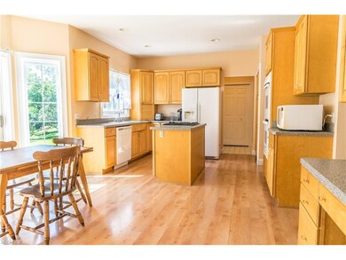 At far end of kitchen is the large side entrance.