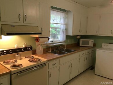 The eat-in kitchen offers good storage and comes c