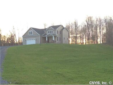 Exterior Front. This home sits up on hill and has 