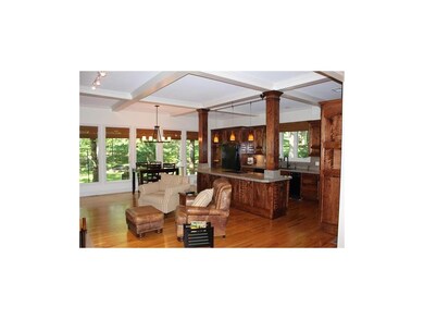 Open kitchen w/granite counters, custom birch cabi