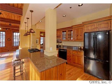 Kitchen. Kitchen has breakfast bar with gas stove 