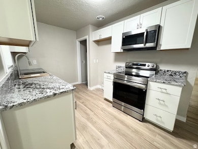 702 N Cowley Dr, Layton, UT 84041 - photo 4