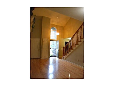 Open entry with high ceilings.