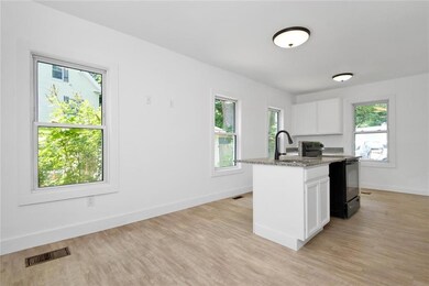 Kitchen has room for tables, hutches...