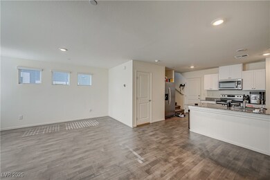 Kitchen featuring appliances with stainless steel