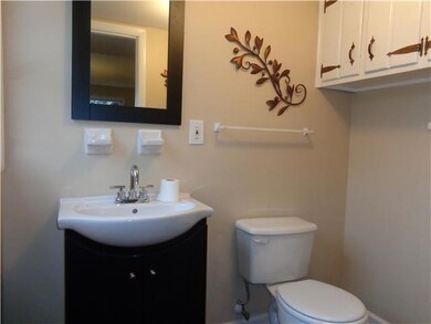 The den/family and kitchen half bath.  All remodeled