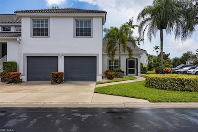 Mediterranean / spanish home featuring a tiled roof, stucco siding, concrete driveway, and an attached garage