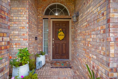 Front porch is pushed back for added privacy.