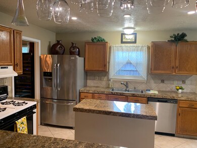 View of Kitchen through Opening from Living Room