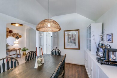 Dining room with hardwood / wood-style floors and 