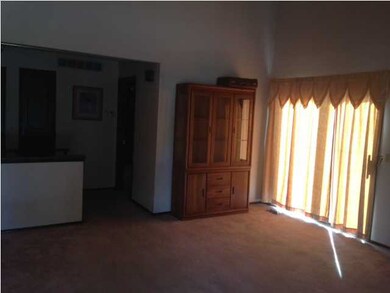 Living room with vaulted ceilings