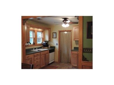 Convenient Kitchen opens to Main Floor Laundry