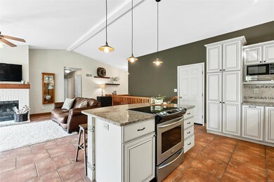 The plentiful cabinets include a big pantry for ex