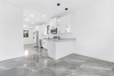 1107 W 18th St, Lehigh Acres, FL 33972 - photo 3