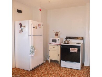 Kitchen comes applianced with the refrigerator and