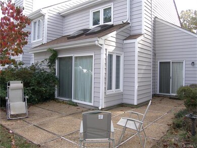 Rear Aggregate Patio with 2 sets of Sliders, one f