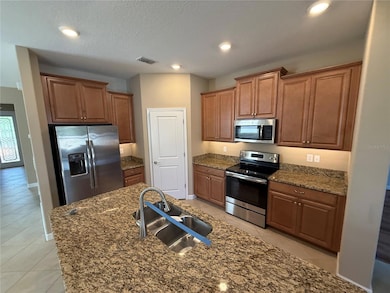 16852 Scuba Crest St, Wimauma, FL 33598 - photo 2