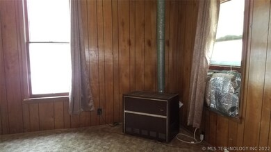 Living room with whole house gas heater