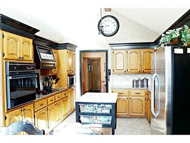 Kitchen. Kitchen has been Updated with Granite Counter Tops & Crown Molding Added to the Cabinets