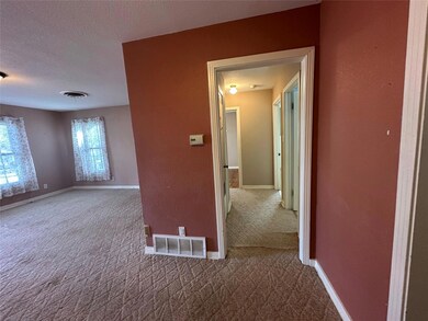 Large living room with Anderson Windows