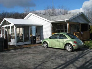 Exterior Front. Covered Deck on the front of the h