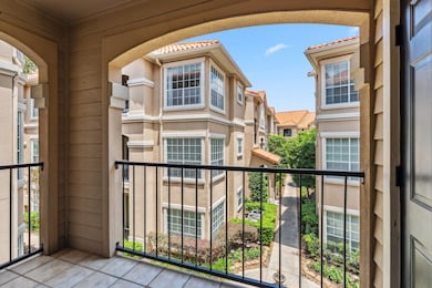Private balcony with tree-lined views and no direc