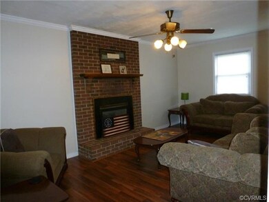Cherry Laminate Floors, Brick Fireplace, Charming 