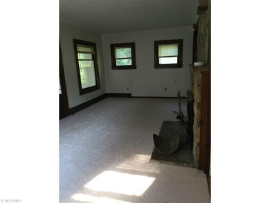 Living Room with wood burning fireplace & New carp