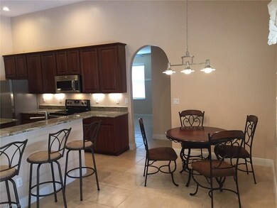 BREAKFAST NOOK WITH PART OF KITCHEN