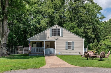 Bungalow with a gate and a porch