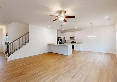 Kitchen featuring stainless steel appliances, whit