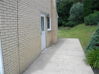 Side porch awaits your grill