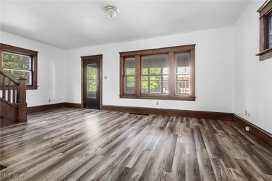 Living room with LVT and original woodwork