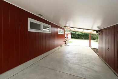 Newer Concrete Carport w/ Additional Entertaining 