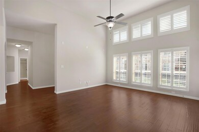 Unfurnished living room with wood finished floors,