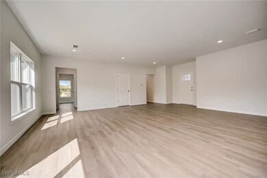 Unfurnished room featuring light wood-type floorin