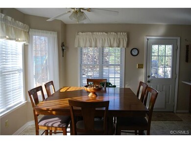 Eat in kitchen with bay window and access to back 