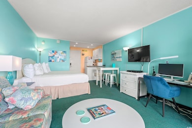 Bedroom featuring carpet floors and freestanding r