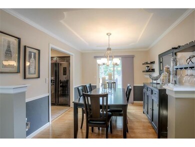 Dining room leads into kitchen & access to deck