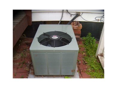 Mechanicals. Newer Ruud Air Conditioner.