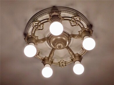 There are lots of lovely light fixtures in this ho