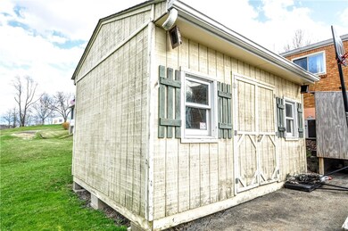 Storage Shed in the back of the home near the driv
